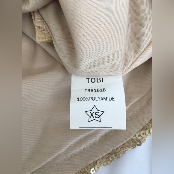 Gorgeous EUC Tobi fully sequined soft gold fully lined miniskirt. - Picture 6 of 7